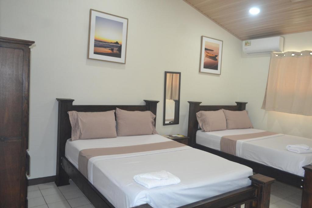 Postel nebo postele na pokoji v ubytování Hotel Don Fito