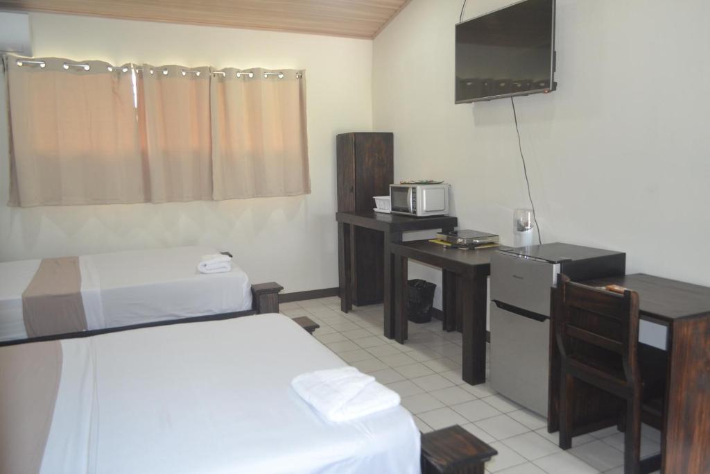 Postel nebo postele na pokoji v ubytování Hotel Don Fito