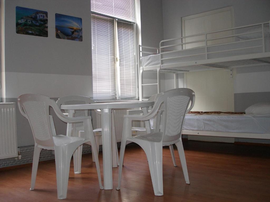 Postel nebo postele na pokoji v ubytování Kretan Hostel