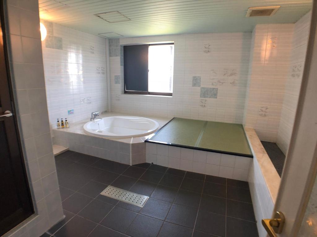 Koupelna v ubytování Hotel Xenia Takinoyashiro