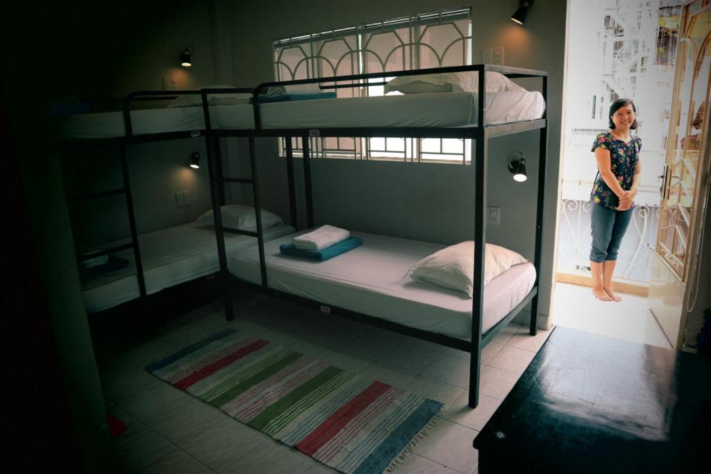 Postel nebo postele na pokoji v ubytování Long Hostel