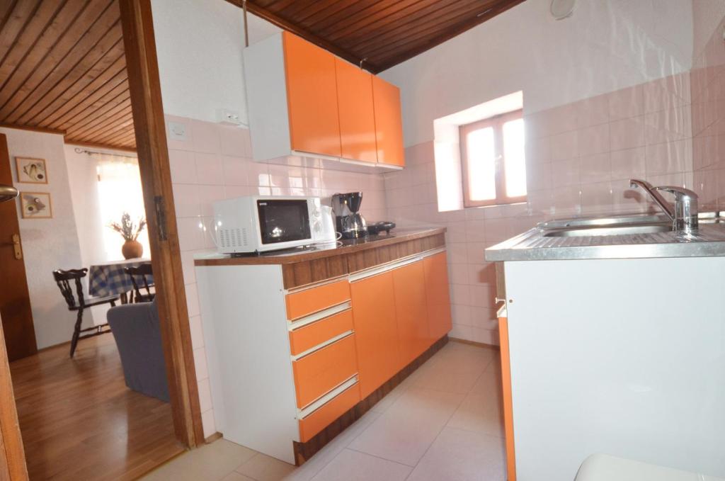 Kuchyňa alebo kuchynka v ubytovaní Dala Apartment