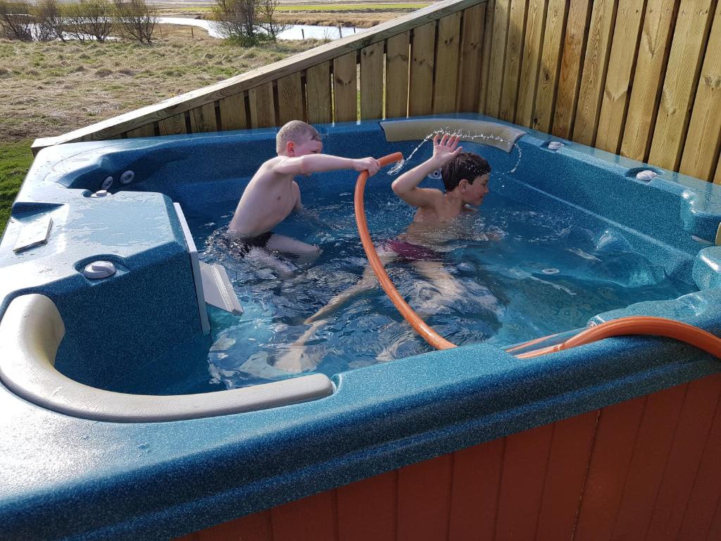 Hosté ubytování Hvammur 1 with private hot tub