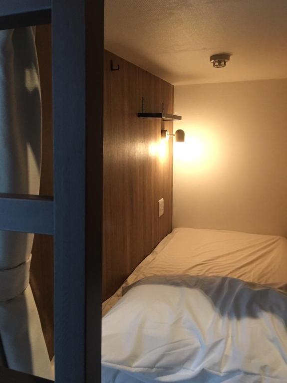 Postel nebo postele na pokoji v ubytování Hostel Kura