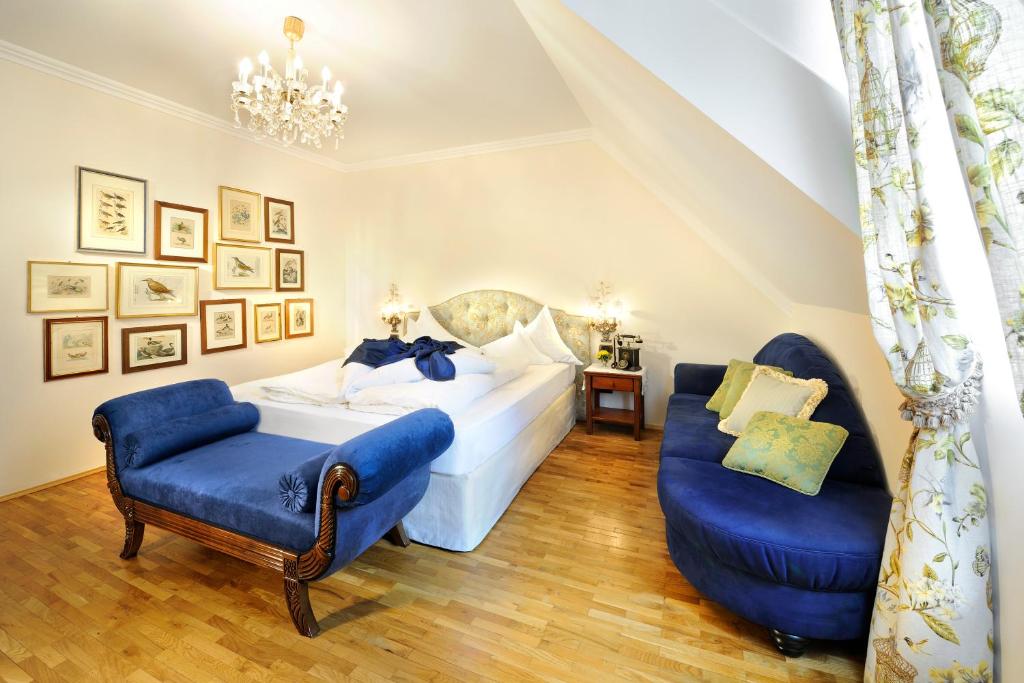 Postel nebo postele na pokoji v ubytování Schloss Hotel Korb