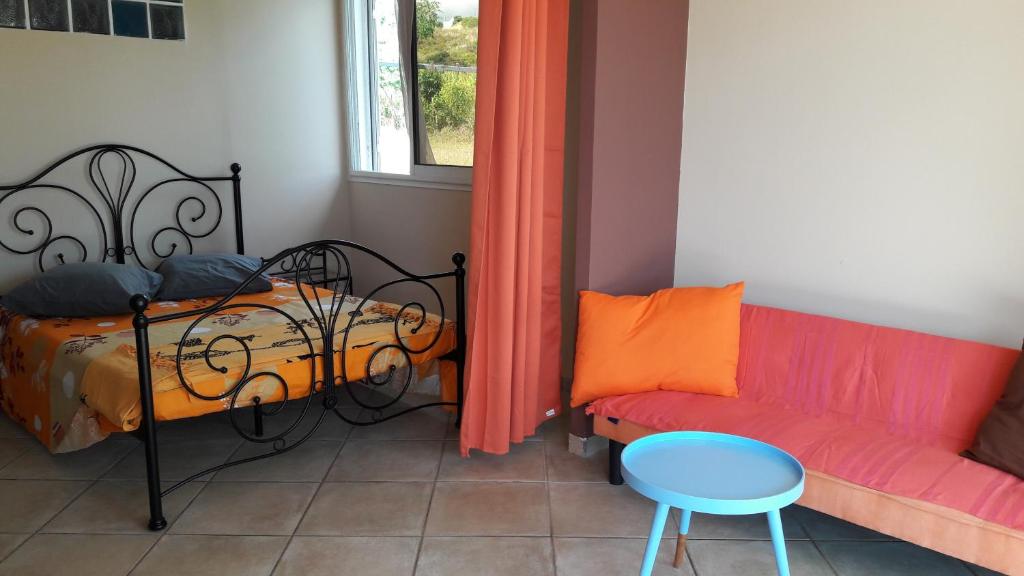 Postel nebo postele na pokoji v ubytování lakazadom974 - Chambres d'Hôtes