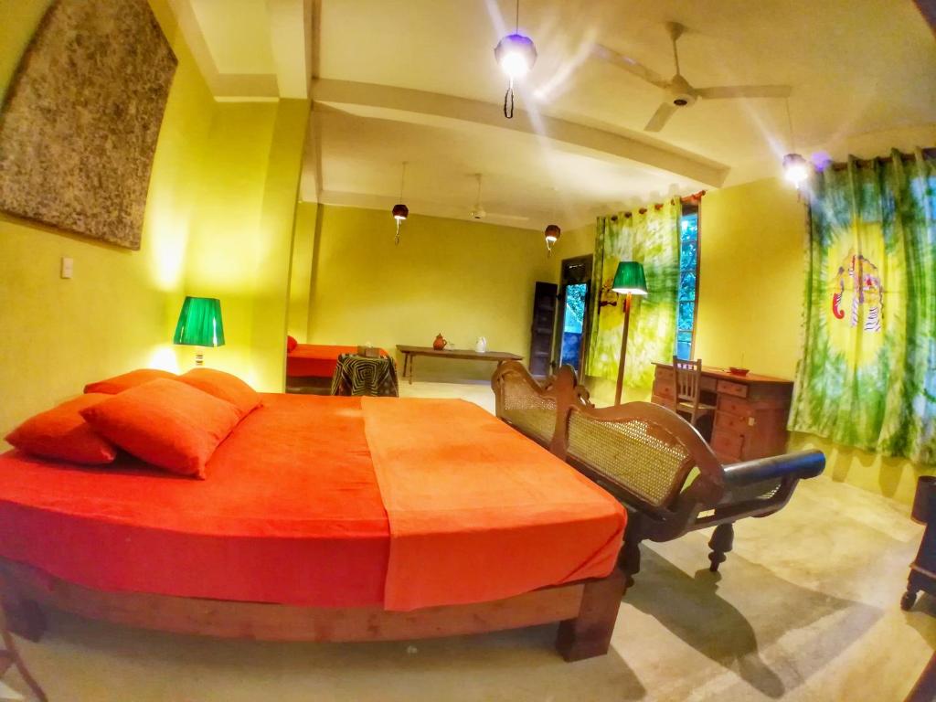 Postel nebo postele na pokoji v ubytování The Kandy Samadhicentre