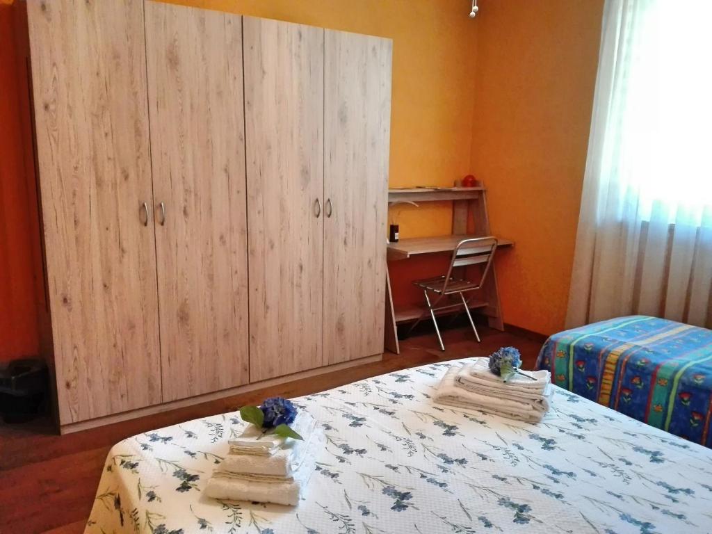 Postel nebo postele na pokoji v ubytování B&B Villa Claudia