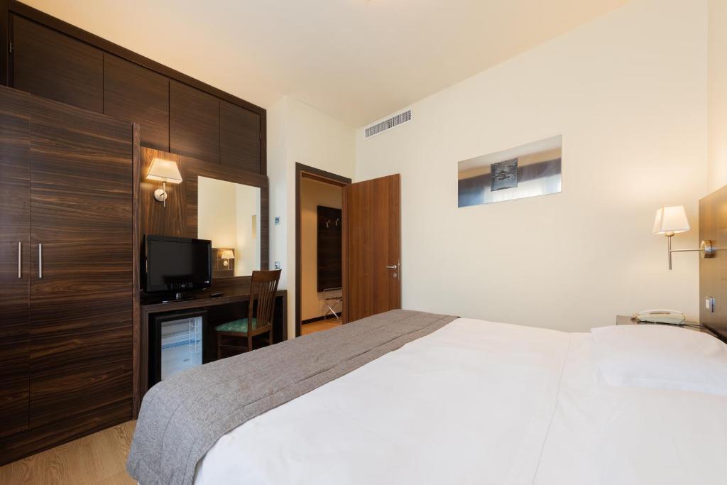 Posteľ alebo postele v izbe v ubytovaní Hotel Delfino Venezia Mestre