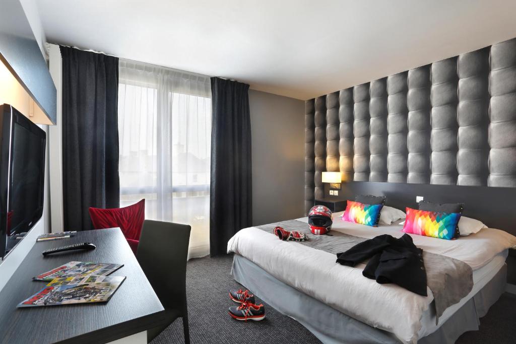 Postel nebo postele na pokoji v ubytování Altos Hotel & Spa