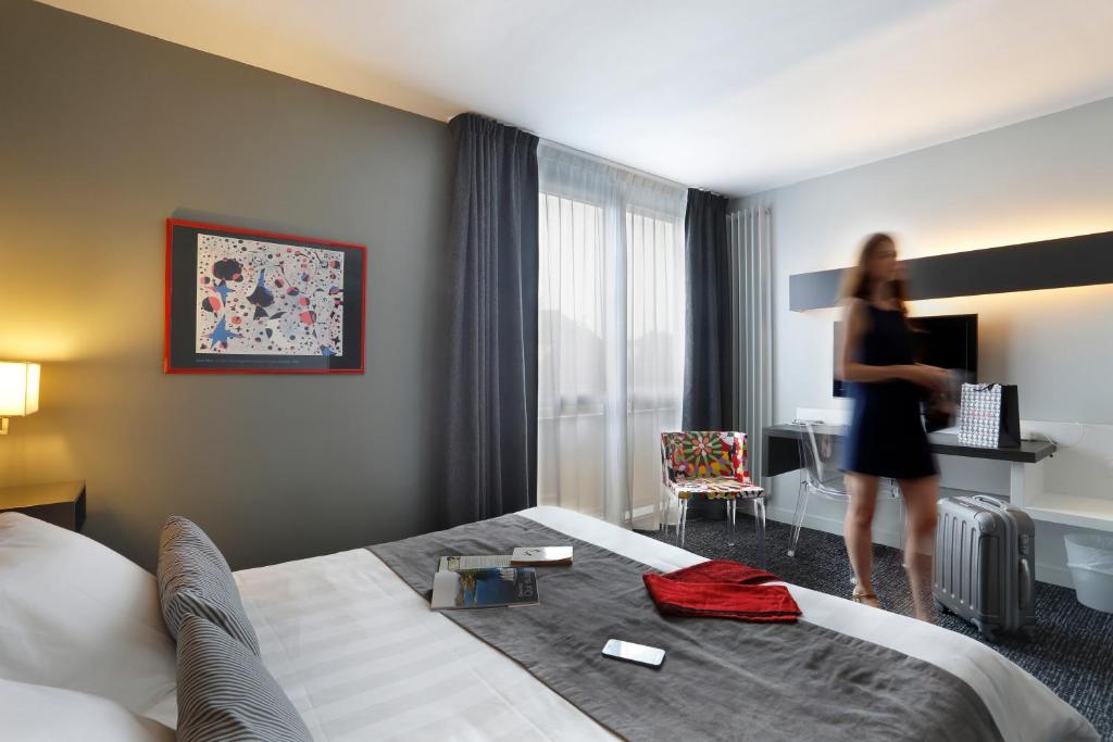 Postel nebo postele na pokoji v ubytování Altos Hotel & Spa