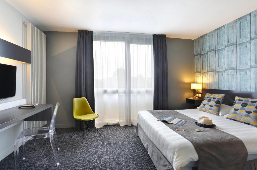 Postel nebo postele na pokoji v ubytování Altos Hotel & Spa