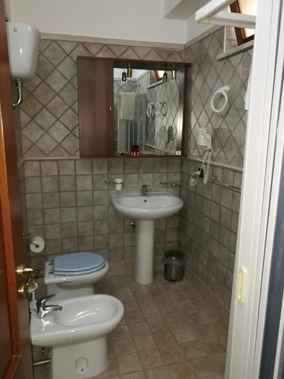 Koupelna v ubytování Garden Inn