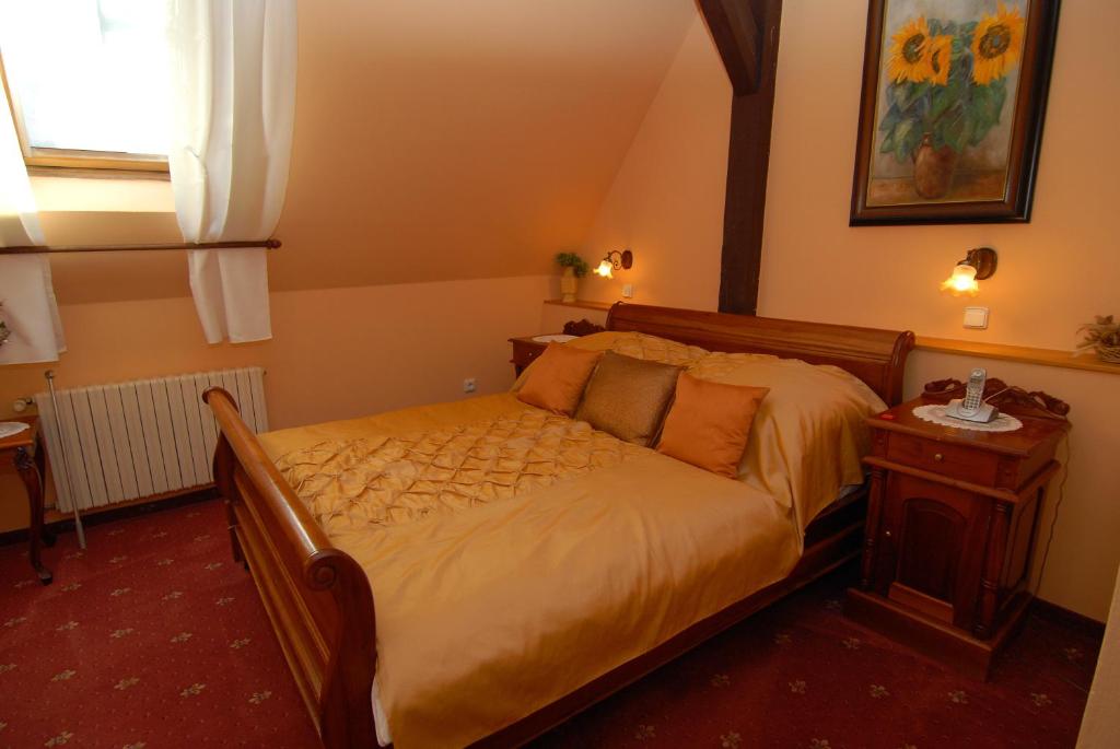 Postel nebo postele na pokoji v ubytování Hotel Opera