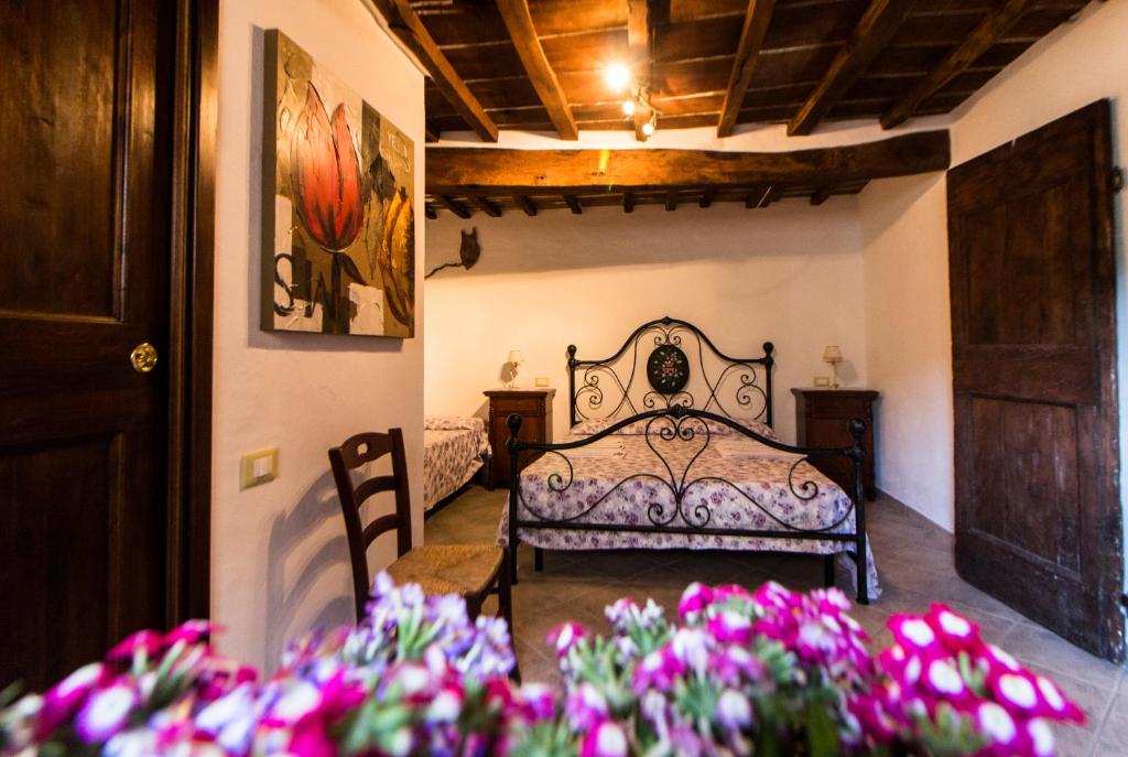 Postel nebo postele na pokoji v ubytování Le Dame del Borgo