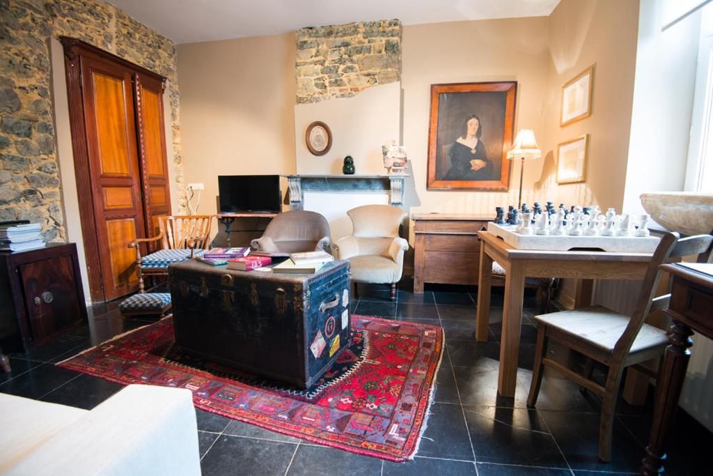 TV a/nebo společenská místnost v ubytování B&B Le Vieux Marronnier
