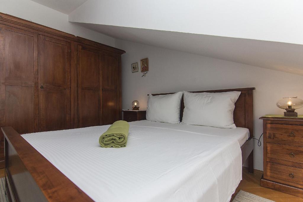 Posteľ alebo postele v izbe v ubytovaní Apartman Podgora