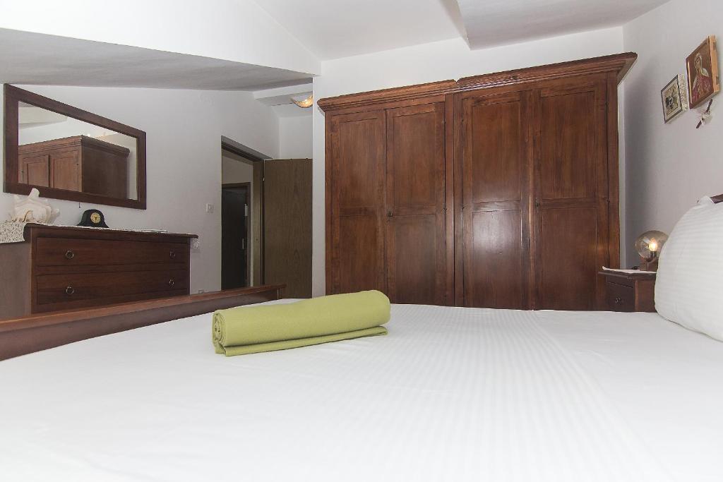 Posteľ alebo postele v izbe v ubytovaní Apartman Podgora