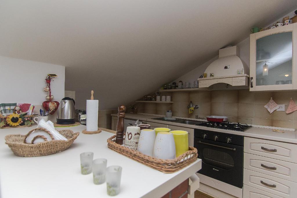 Kuchyňa alebo kuchynka v ubytovaní Apartman Podgora