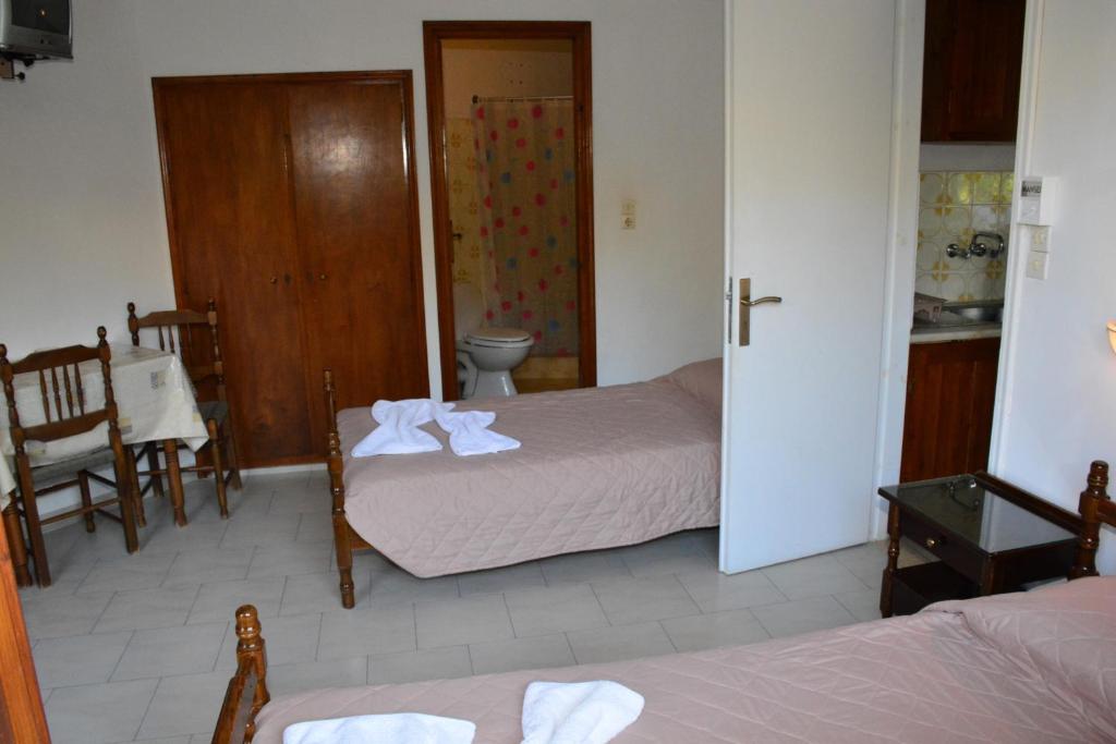 Posteľ alebo postele v izbe v ubytovaní Voula Apartments