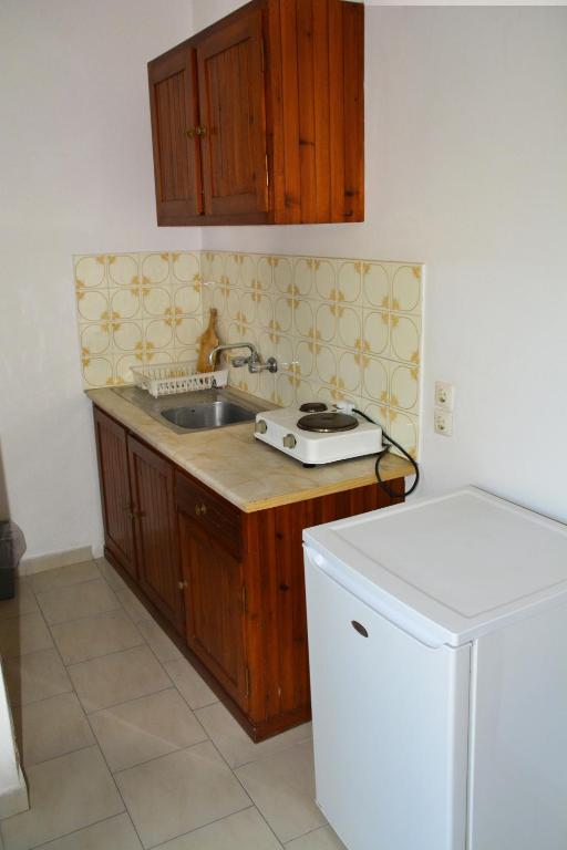 Kuchyňa alebo kuchynka v ubytovaní Voula Apartments