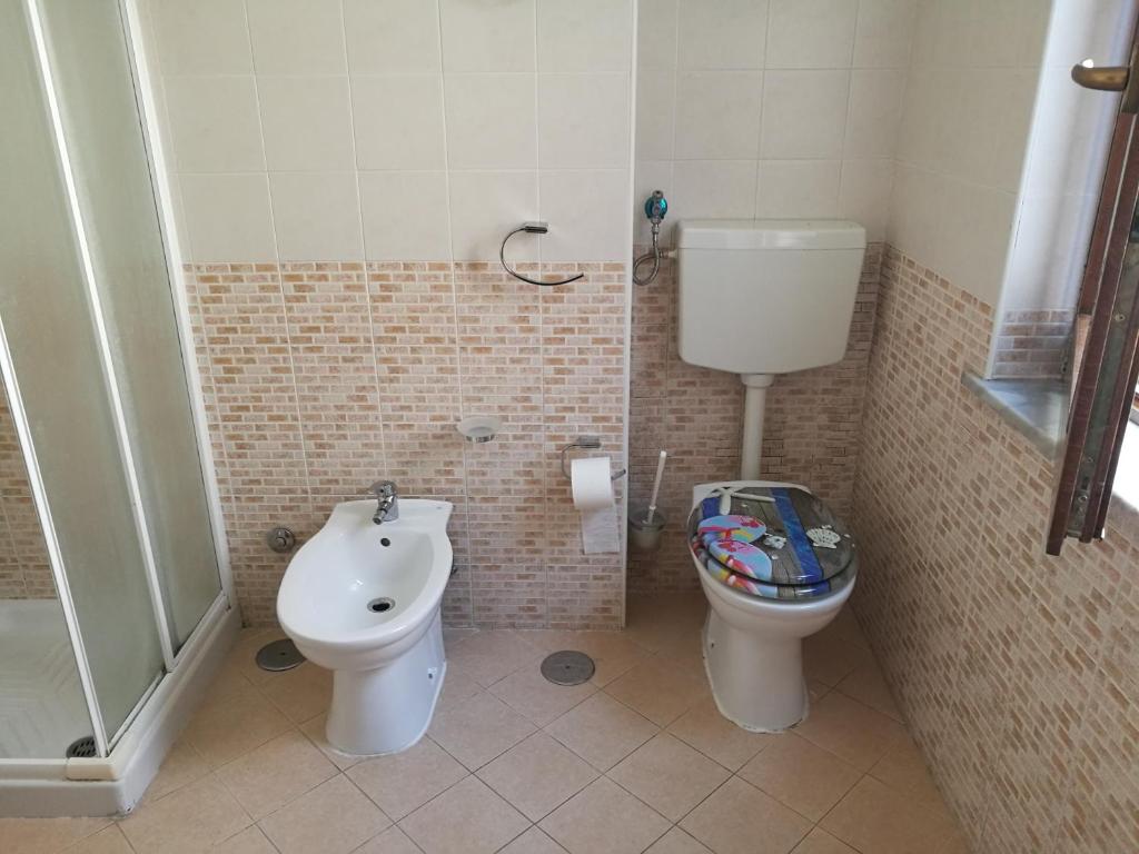 Koupelna v ubytování Garden Inn