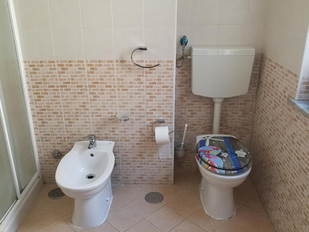 Koupelna v ubytování Garden Inn