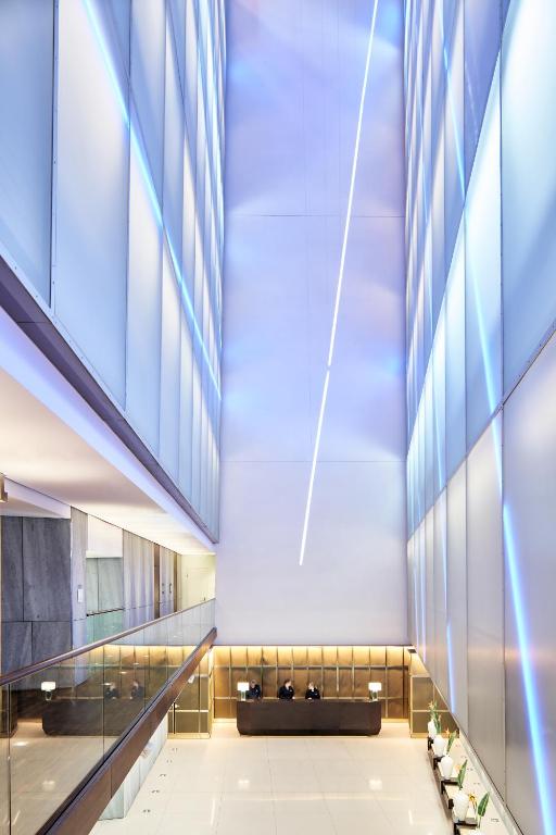 a view of the lobby of a building at SIDE, Hamburg, a Member of Design Hotels in Hamburg