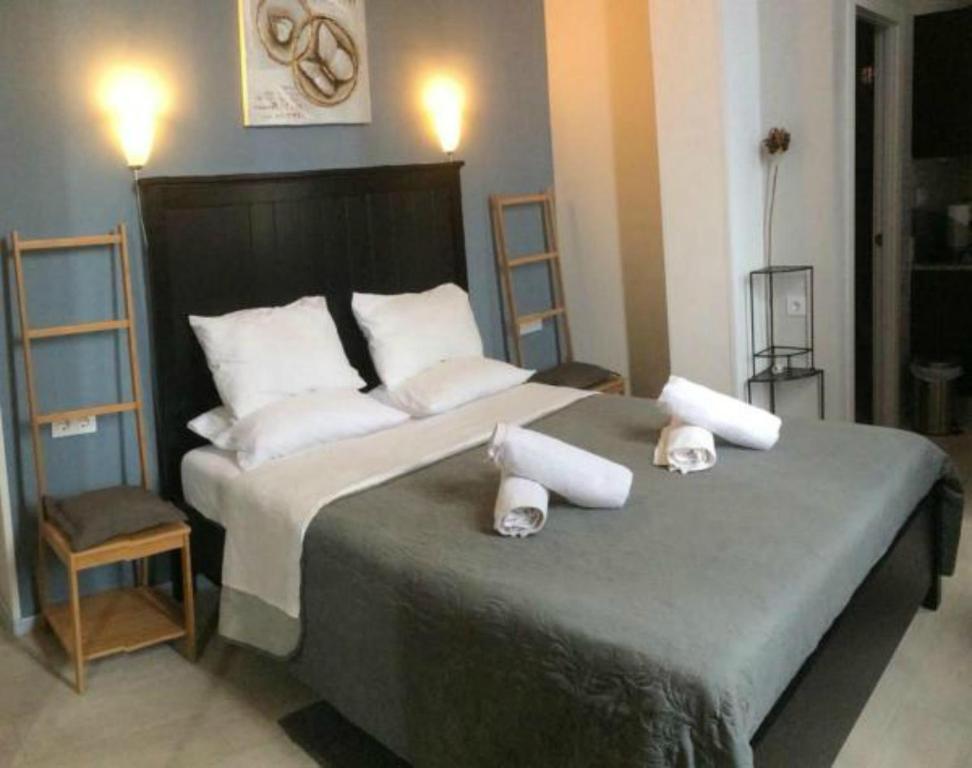 Postel nebo postele na pokoji v ubytování Las Flores studio 3