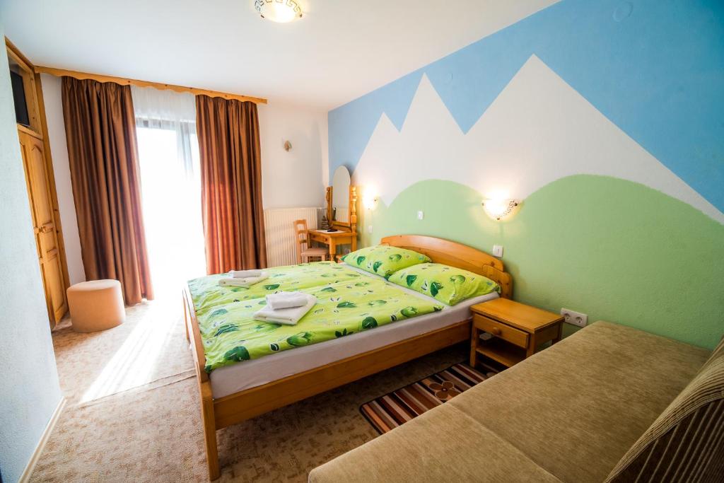 Postel nebo postele na pokoji v ubytování Bed & Breakfast Hisa Resje