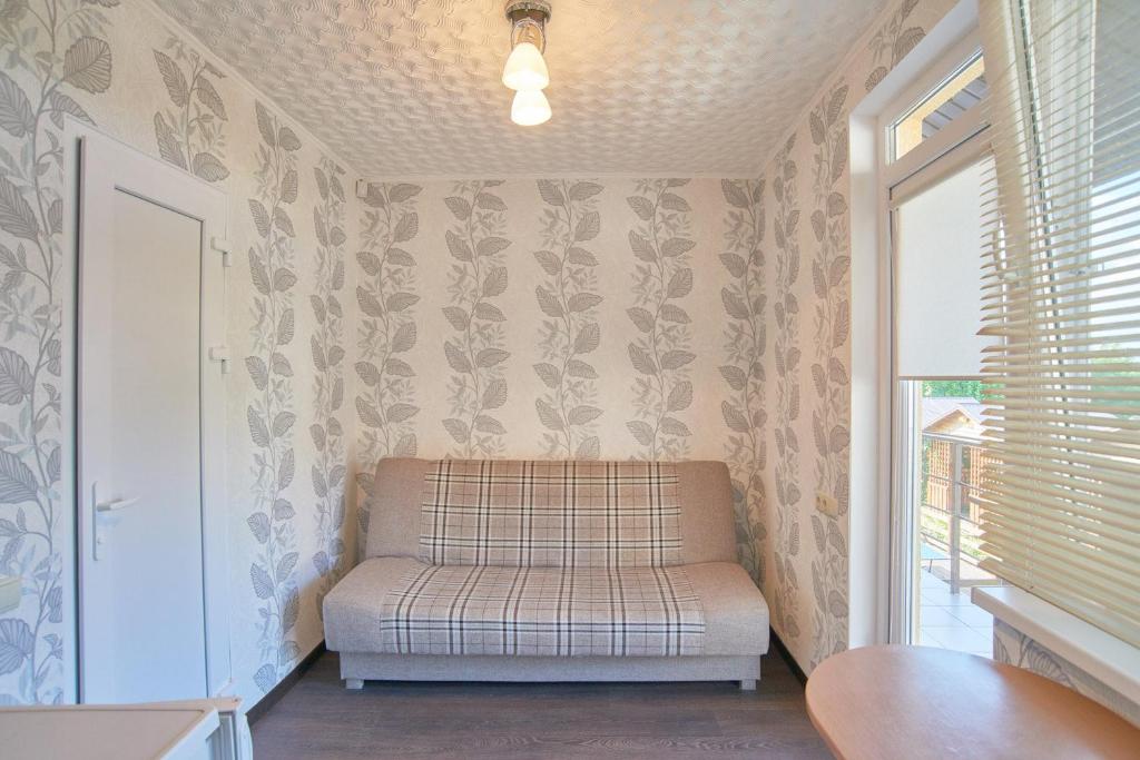 Postel nebo postele na pokoji v ubytování Guest House Filin
