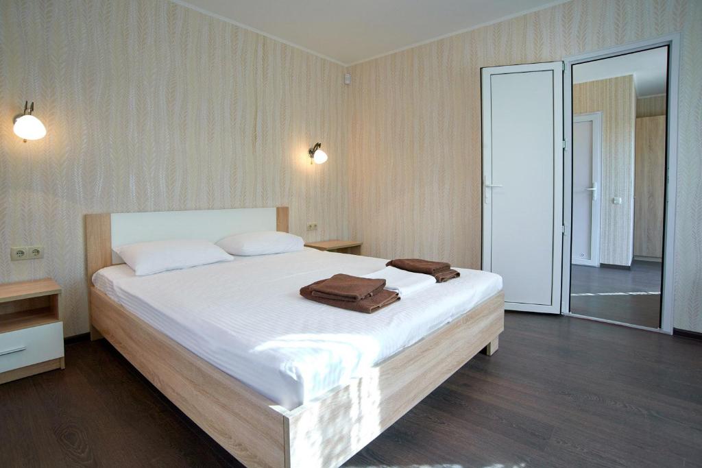 Postel nebo postele na pokoji v ubytování Guest House Filin
