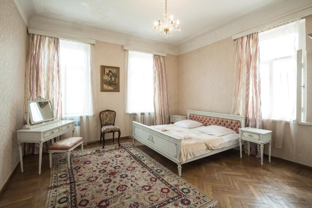 Postel nebo postele na pokoji v ubytování Mary's Apartment