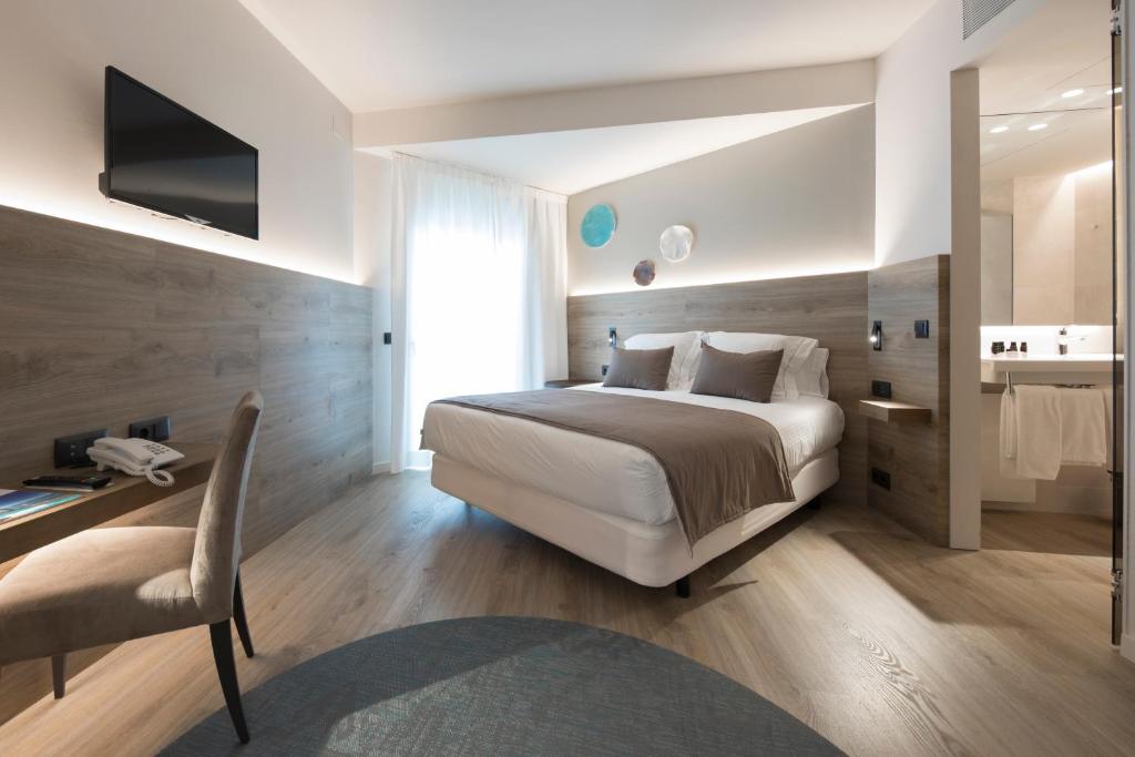 Postel nebo postele na pokoji v ubytování Hotel & Spa Terraza 4 Sup