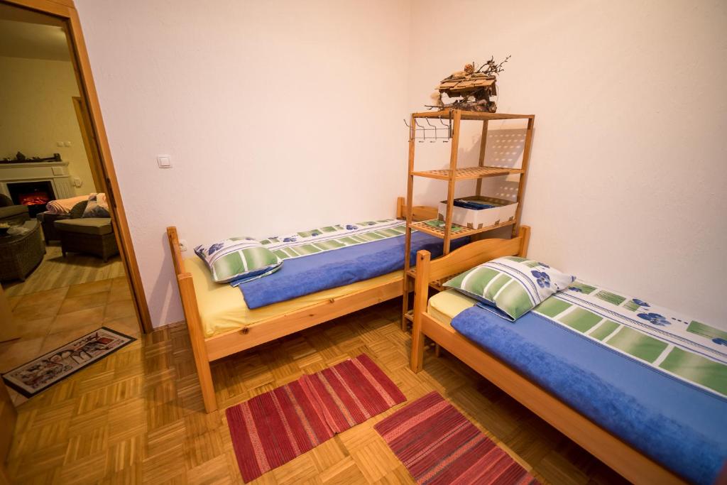 Postel nebo postele na pokoji v ubytování Guest House Frata