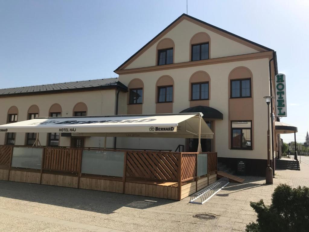 a building with a tent in front of it at Hotel pod Hůrkou in Háj ve Slezsku