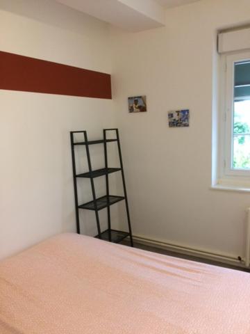 Postel nebo postele na pokoji v ubytování Relais Maximilien