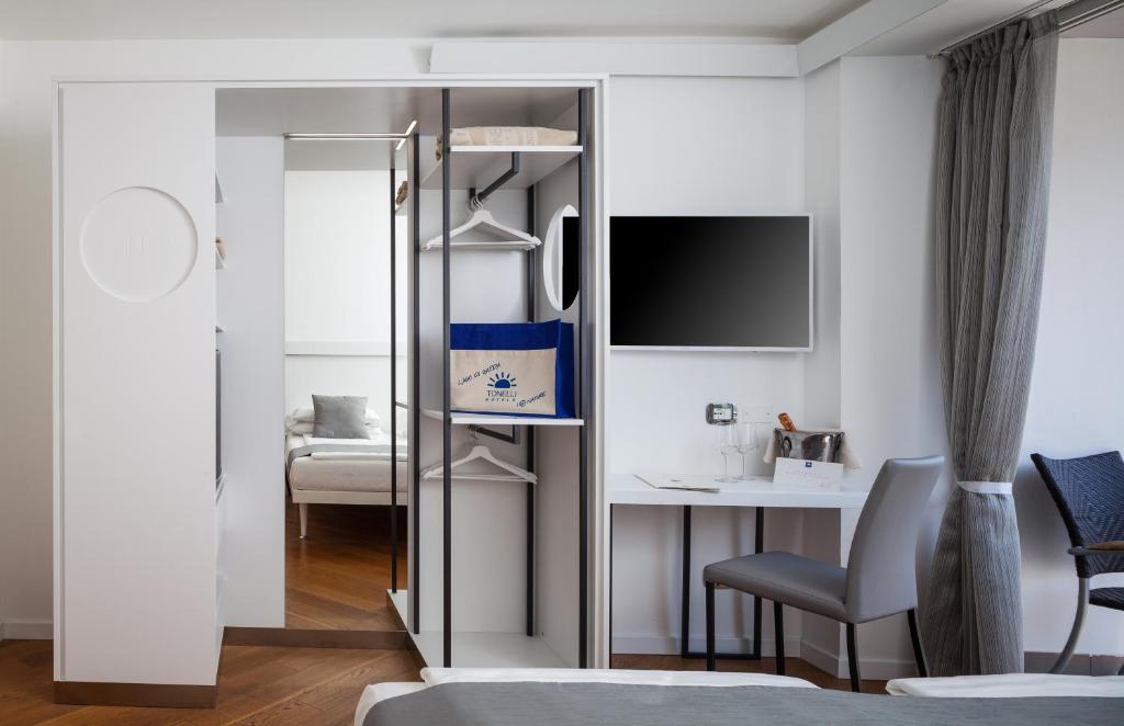 TV a/nebo společenská místnost v ubytování Hotel Continental - Tonelli Hotels