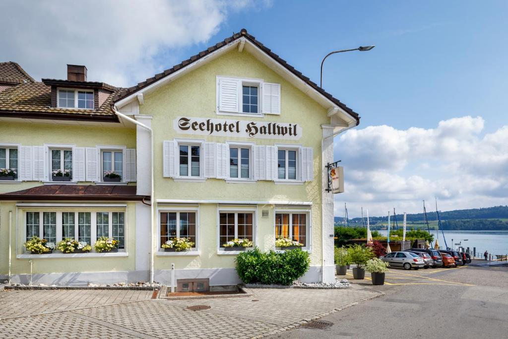 a building with the name of a seafood restaurant at Hallwil Swiss Quality Seehotel in Beinwil