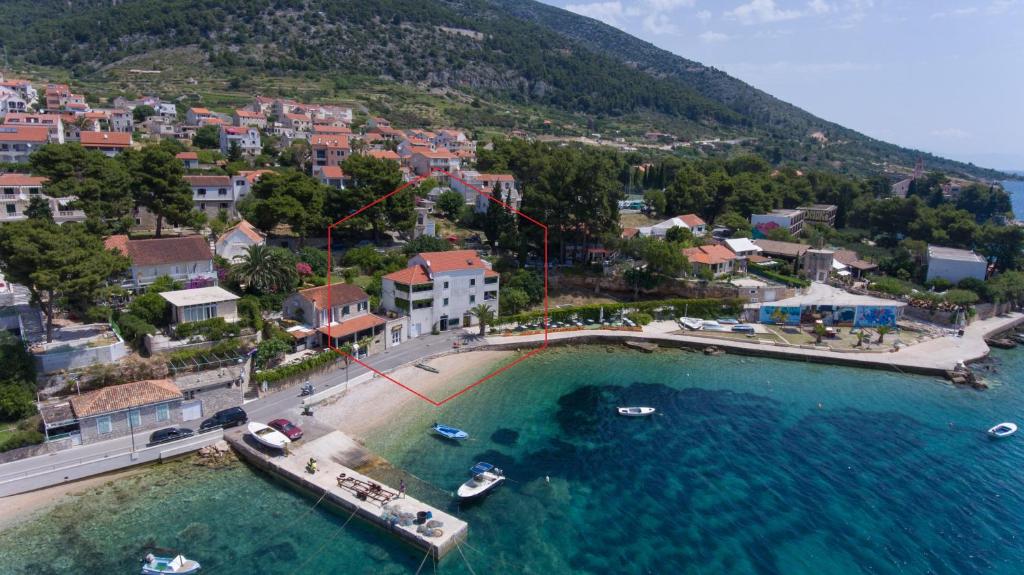 an aerial view of a town and a body of water at Apartments Laguna 2 in Bol