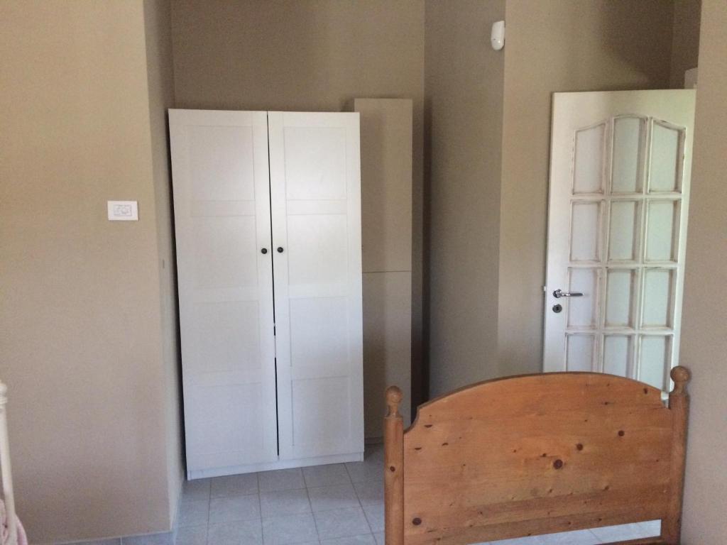 Postel nebo postele na pokoji v ubytování Villa L'Ottagono con cucina parcheggio privato telecamerizzato e wifi