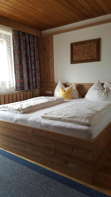 Postel nebo postele na pokoji v ubytování Pension Singer