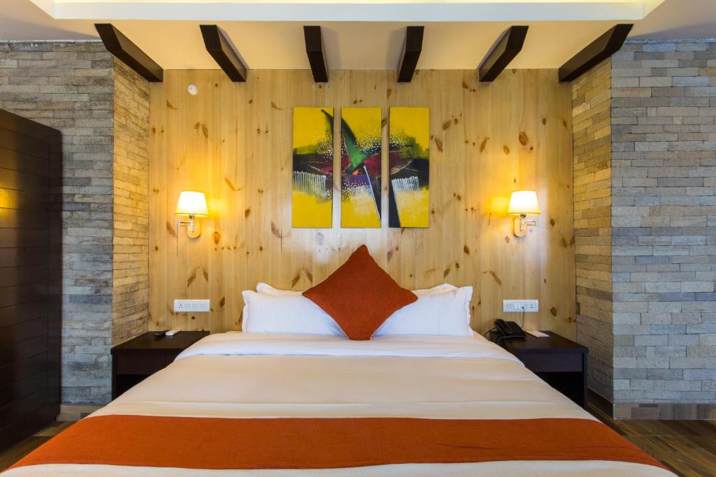 Postel nebo postele na pokoji v ubytování Bodhi Suites Boutique Hotel and Spa