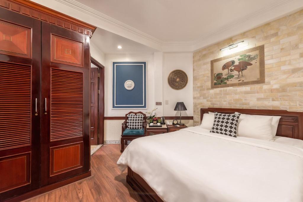 Postel nebo postele na pokoji v ubytování Prince II Hotel