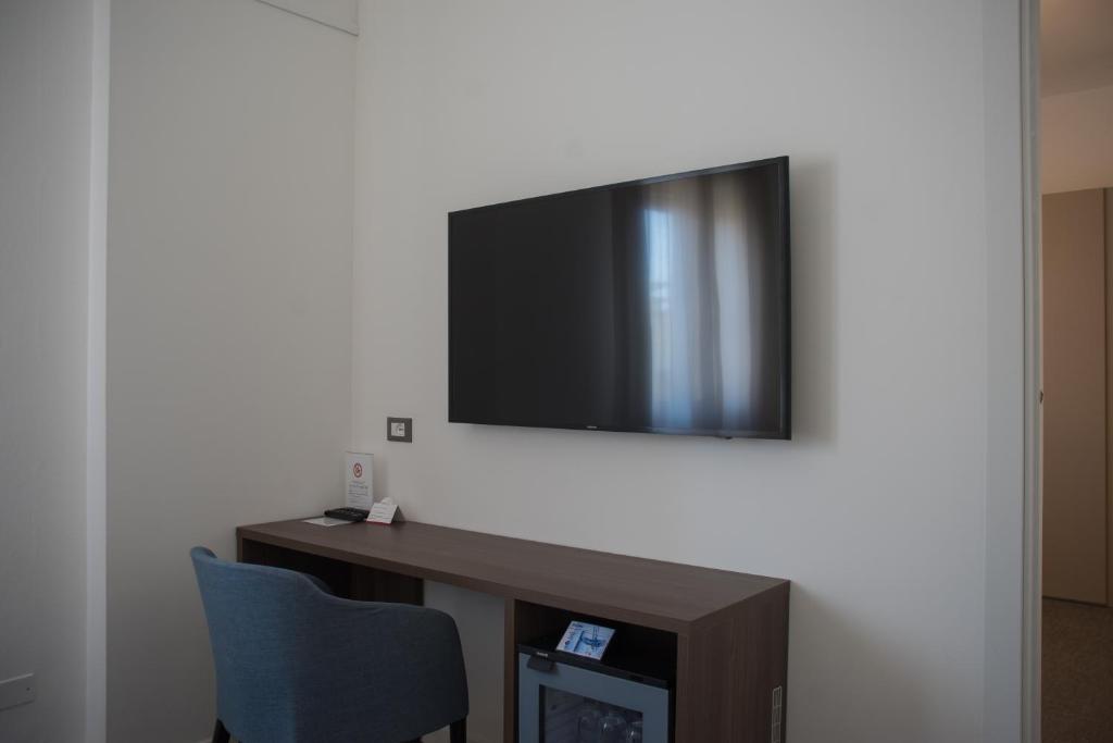 TV a/nebo společenská místnost v ubytování Hotel Villa Sorriso