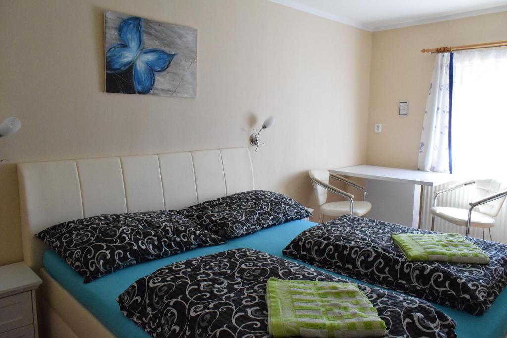 Letto o letti in una camera di Penzion Sv. Duch