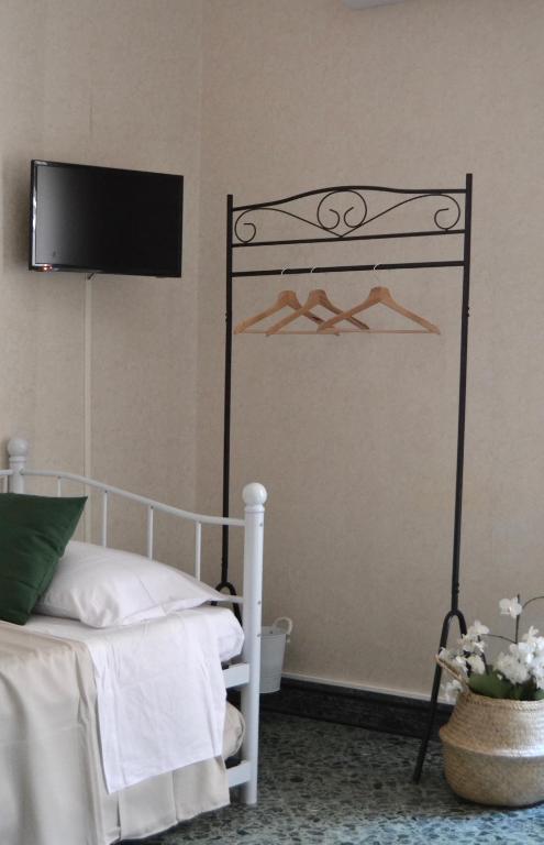 Łóżko lub łóżka w pokoju w obiekcie Casa Jolanda B&B