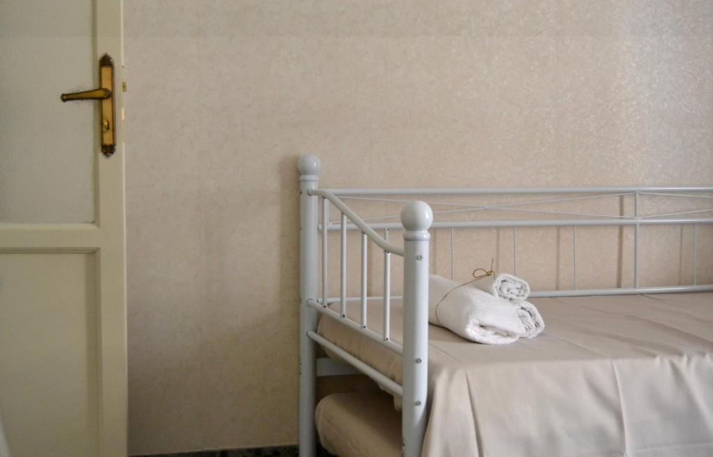 Łóżko lub łóżka w pokoju w obiekcie Casa Jolanda B&B