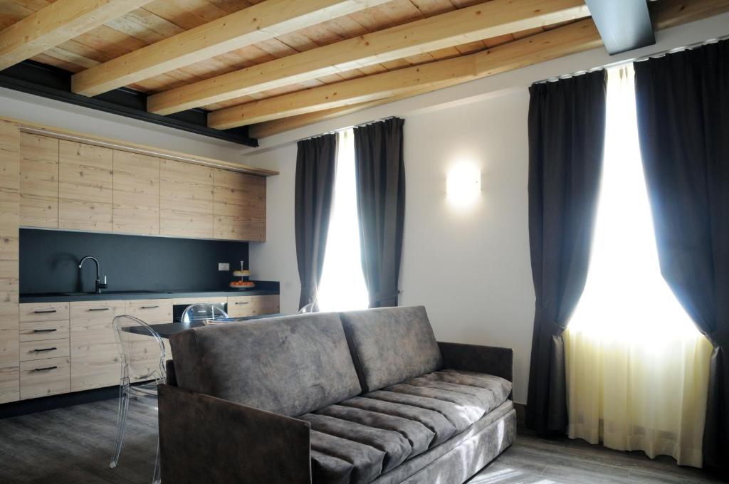 A seating area at TOURING HOTEL & SPA