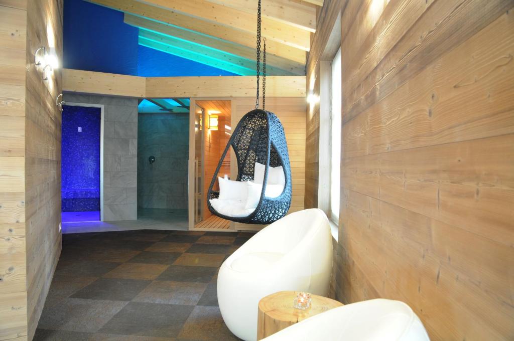 A seating area at TOURING HOTEL & SPA